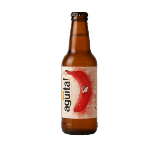 Cerveza artesanal con plátano de Canarias estilo Witbier Agüita Trigo Rojo, cerveza con plátano rojo canario Botella Agüita Witbier de Tenerife con espuma cremosa